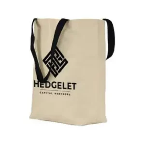 Tonga Tragetasche aus Baumwolltuch mit natürlichen Unterboden und farbigen Tragegriffen.